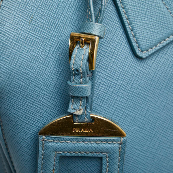 プラダ 三角ロゴプレート サフィアーノ ハンドバッグ ライトブルー レザー レディース PRADA 【中古】