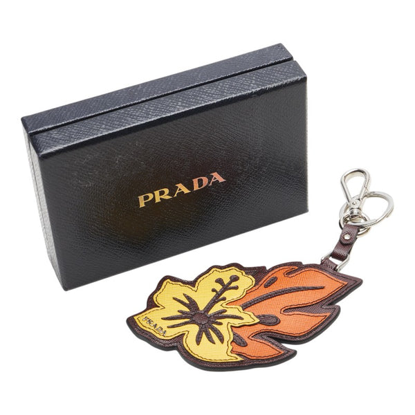 プラダ ハイビスカス チャーム オレンジ イエロー ブラウン レザー レディース PRADA 【中古】