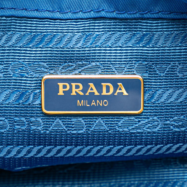 プラダ 三角ロゴプレート ポーチ 巾着バッグ ブルー ナイロン レザー レディース PRADA 【中古】