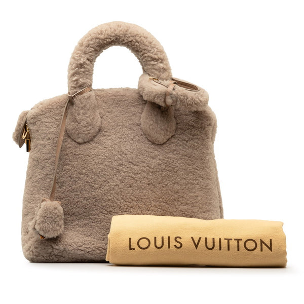 ルイ ヴィトン ロックイット ヴォワヤージュ ハンドバッグ M93850 グレージュ  ムートン レザー レディース LOUIS VUITTON 【中古】